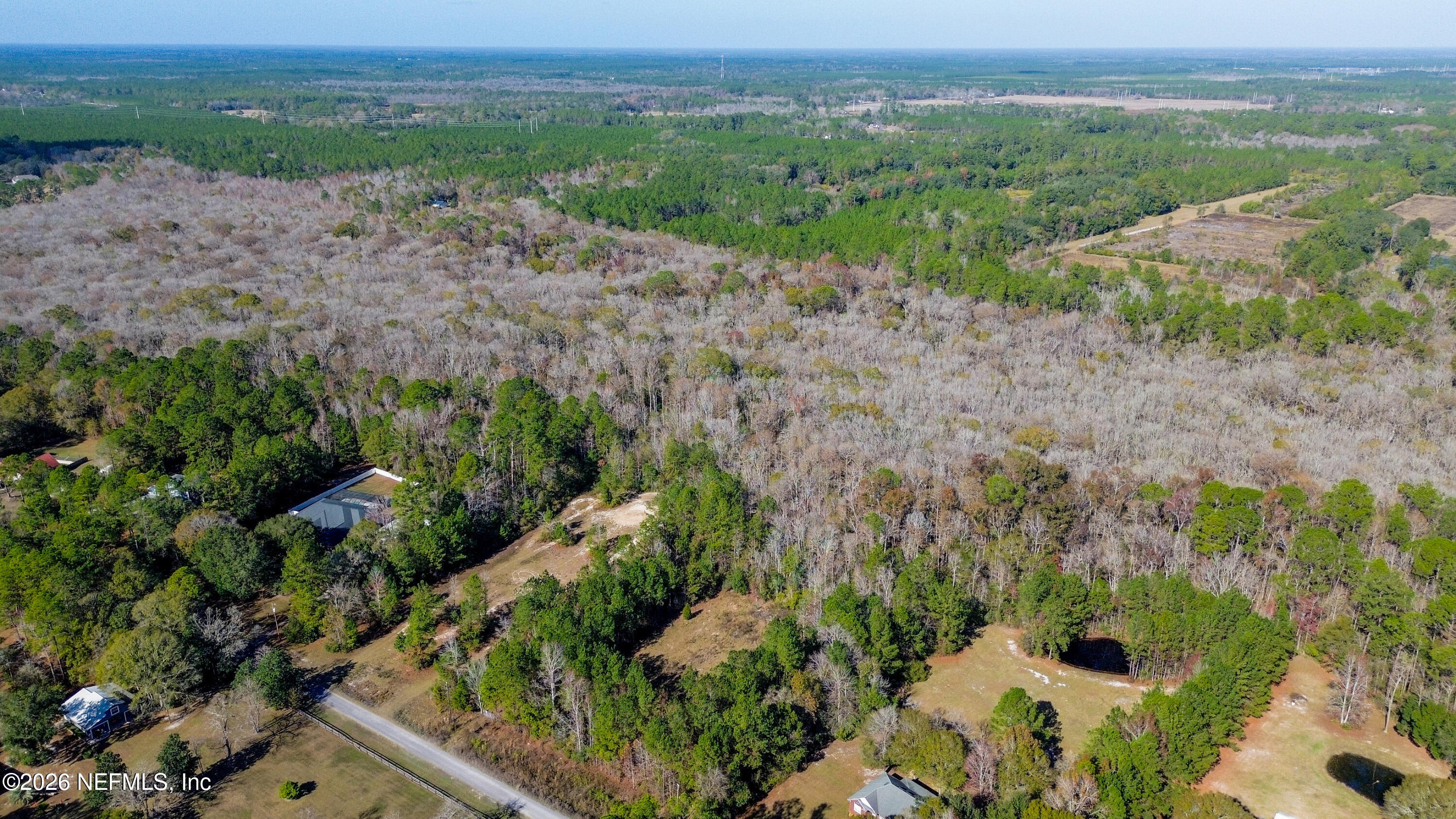 7847 Red Top Road Macclenny, FL 32063 - Photo 10 of 23 a view of a yard with a street