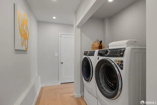 a utility room with dryer and washer