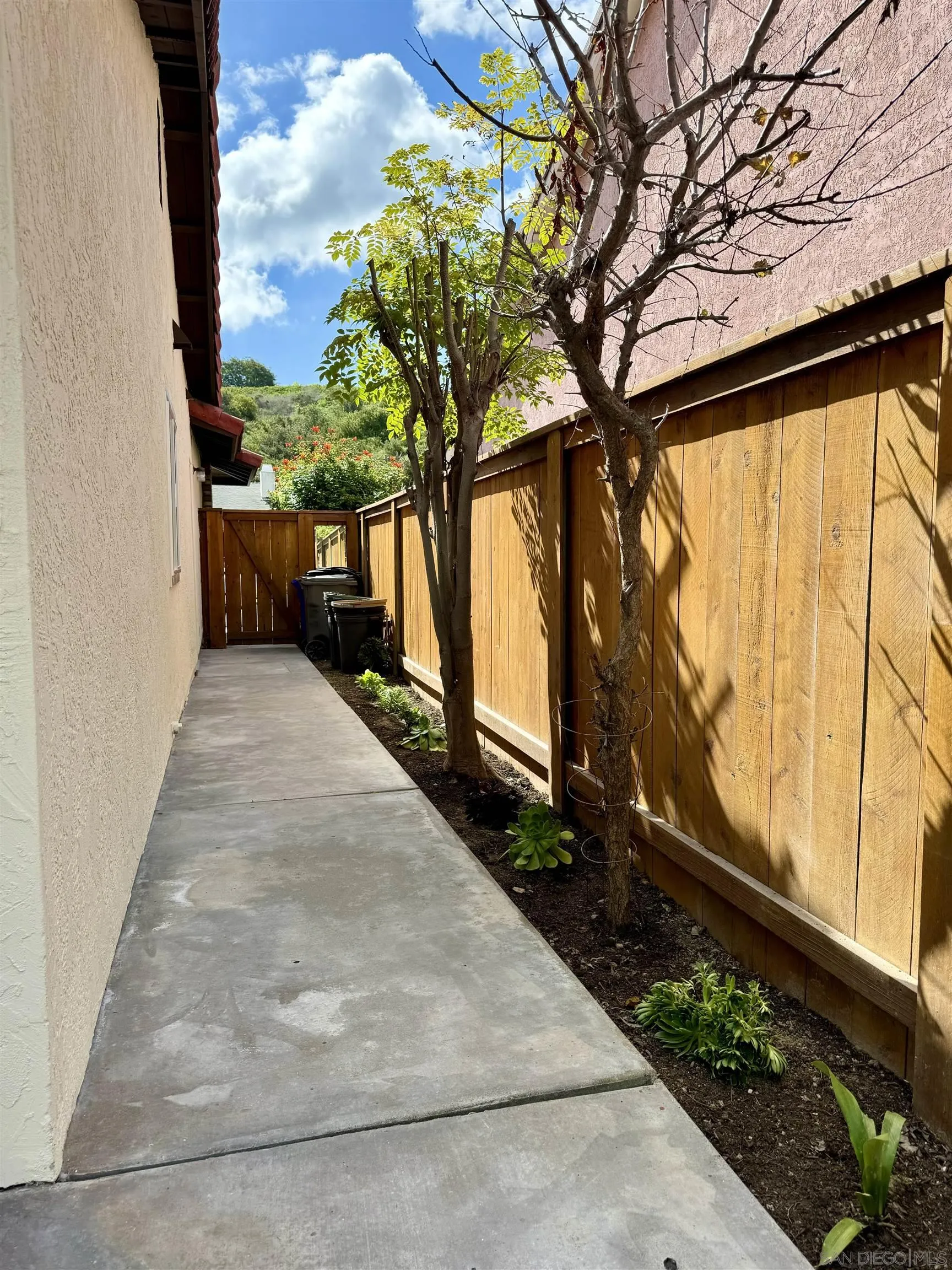 3754 Cameo Drive Oceanside, CA 92056 - Photo 25 of 31 a view of balcony with wooden floor and fence