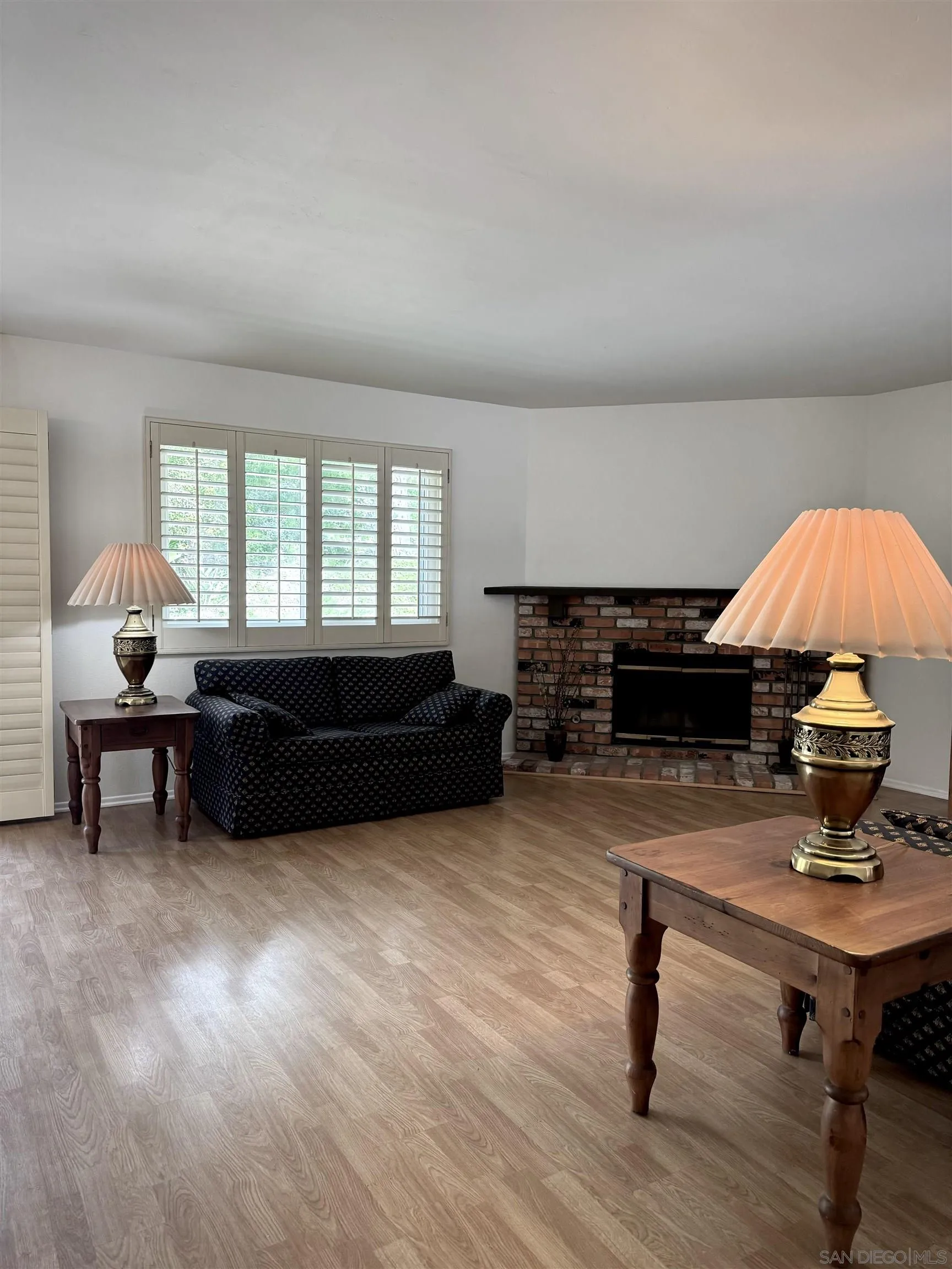 3754 Cameo Drive Oceanside, CA 92056 - Photo 4 of 31 a living room with furniture a window and a table