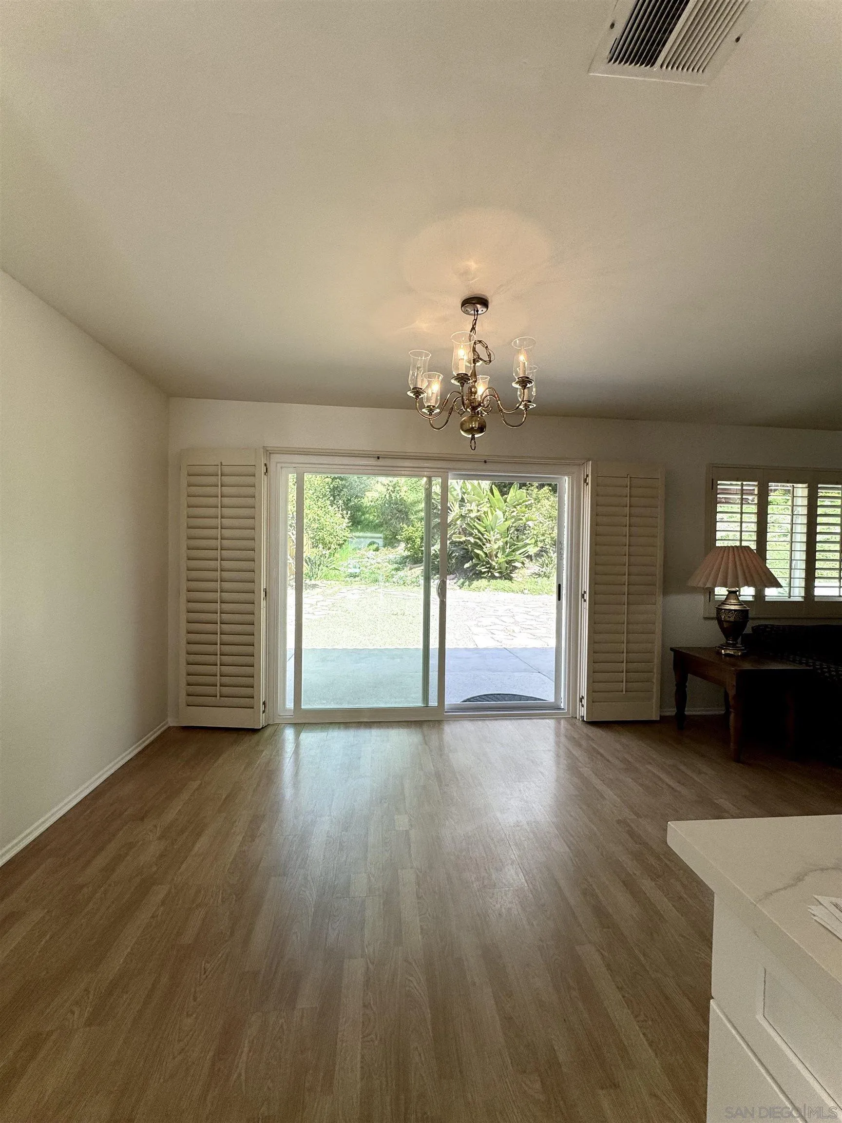3754 Cameo Drive Oceanside, CA 92056 - Photo 6 of 31 a view of a livingroom with a window and wooden floor