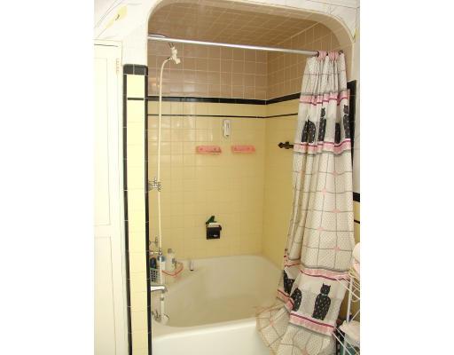 299 Beverly Road Brookline, MA 02467 - Photo 18 of 22 a bathroom with a bathtub and shower