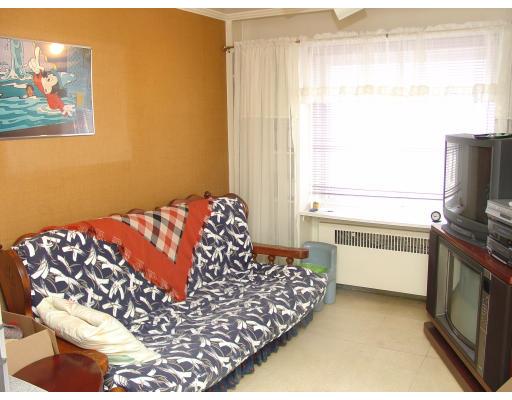 299 Beverly Road Brookline, MA 02467 - Photo 5 of 22 a bedroom with a bed and a window