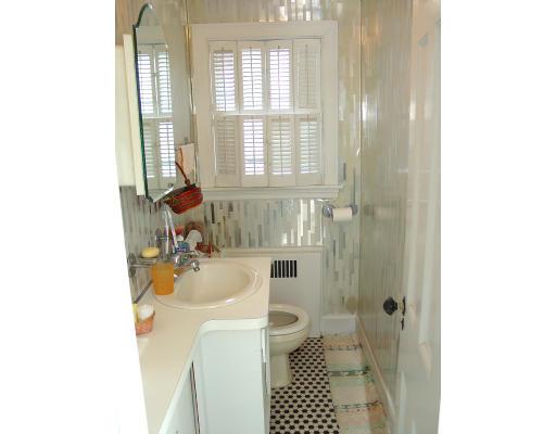 299 Beverly Road Brookline, MA 02467 - Photo 10 of 22 a bathroom with a sink toilet and shower