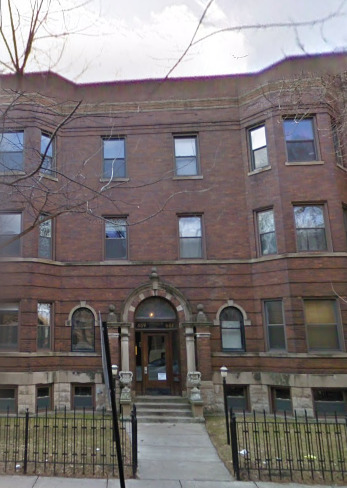 a front view of a building with glass windows