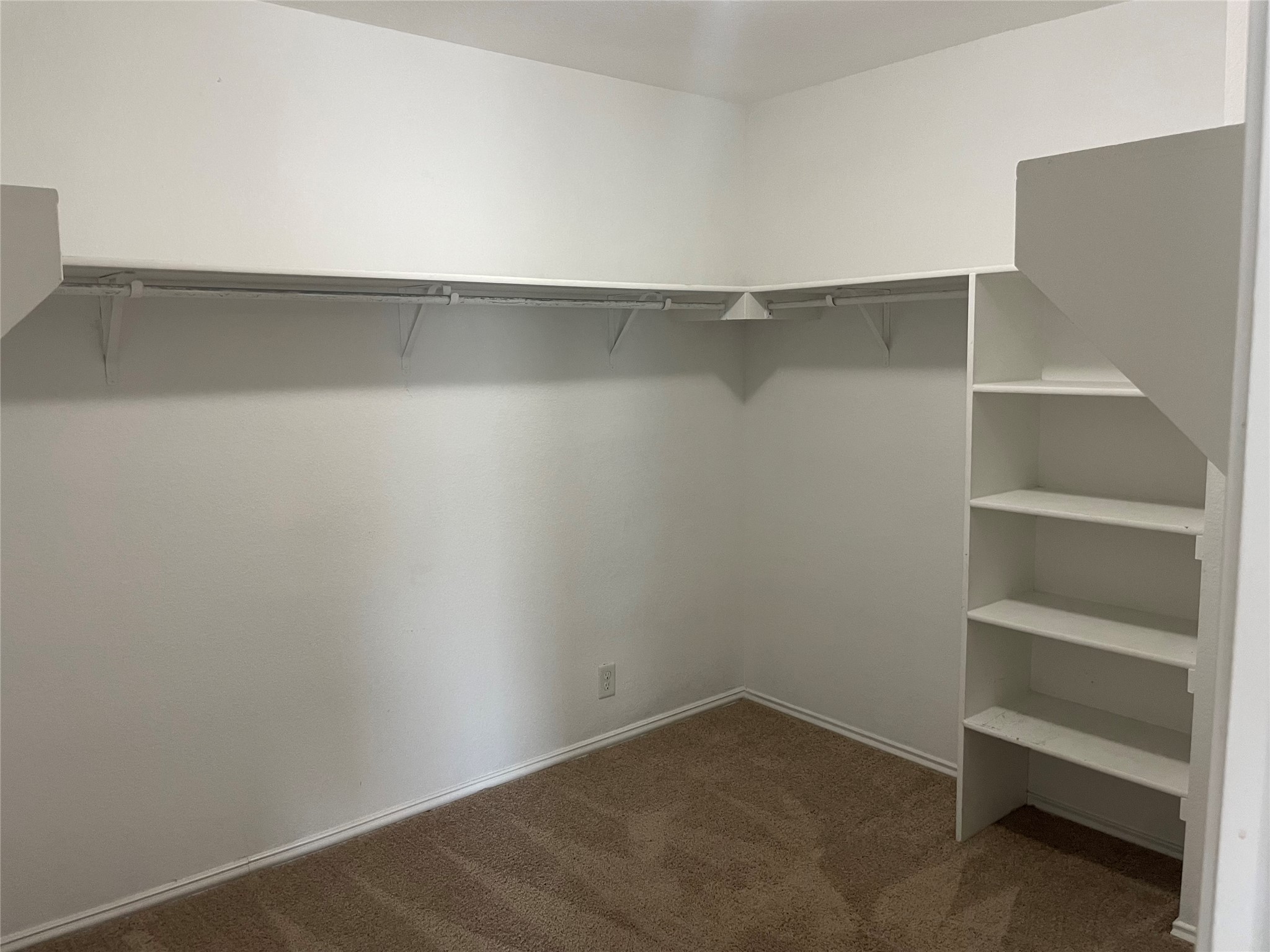 122 Rummel Drive Kyle, TX 78640 - Photo 12 of 18 Functional shelving and ample hanging space define this convenient walk-in closet.