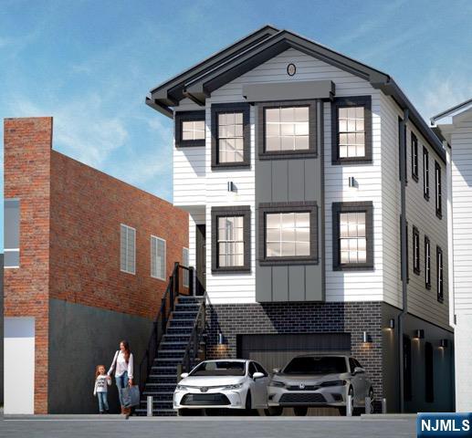 a front view of a house with many windows