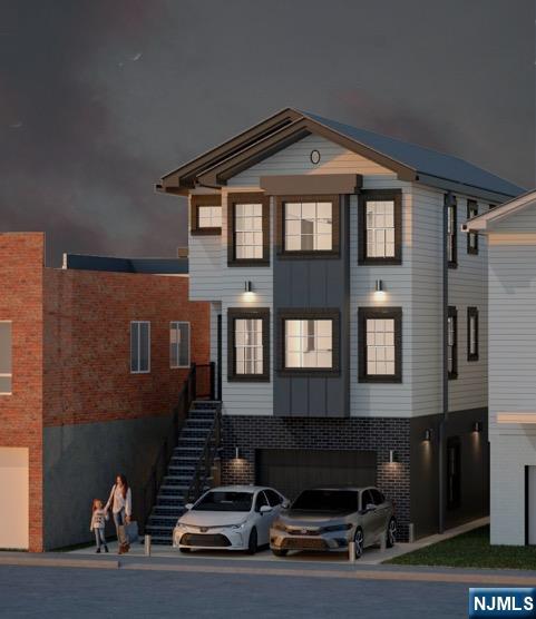 6211 Adams Street West New York, NJ 07093 - Photo 6 of 6 a front view of a house with yard