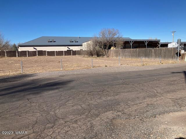 67 South Pinal Street Springerville, AZ 85938 - Photo 3 of 5 a view of a house with a yard