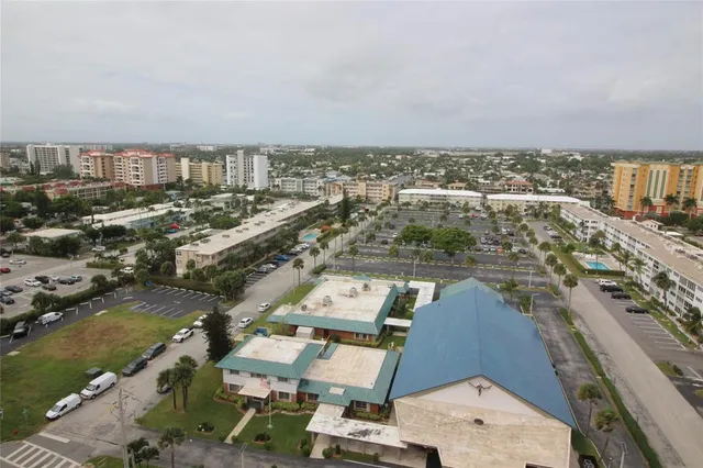 an aerial view of a city with lots of residential buildings