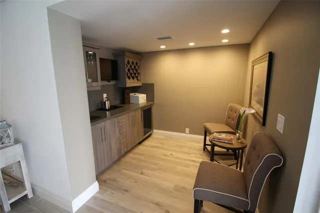 a view of a workspace with furniture