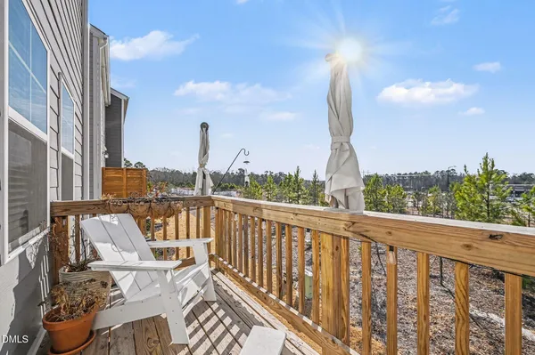 a kitchen with stainless steel appliances a refrigerator sink and stove