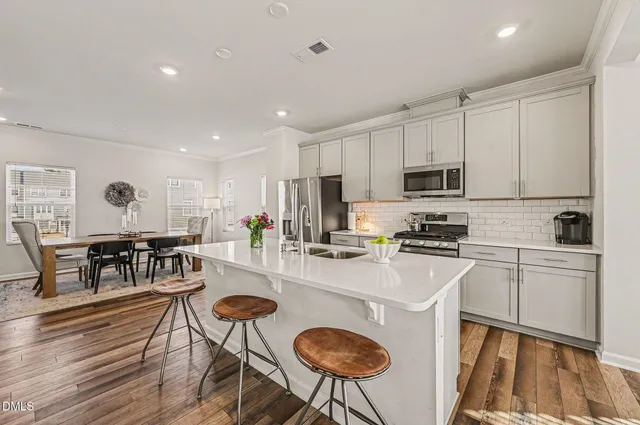 a view of an empty room and a windows