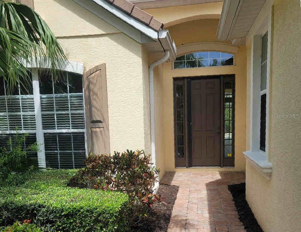 7486 Edenmore Street Lakewood Ranch, FL 34202 - Photo 3 of 28 a view of entrance