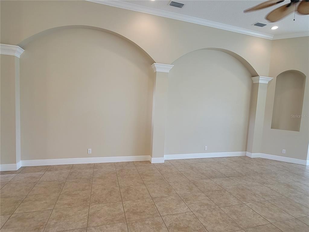 7486 Edenmore Street Lakewood Ranch, FL 34202 - Photo 8 of 28 a view of an empty room