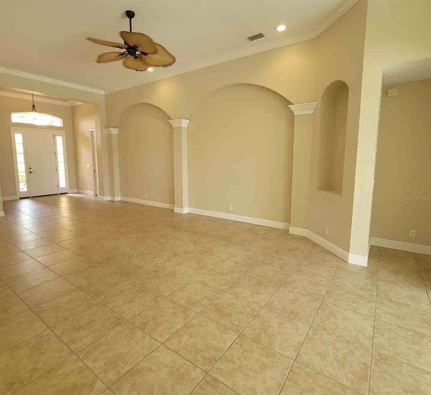 7486 Edenmore Street Lakewood Ranch, FL 34202 - Photo 9 of 28 a view of an empty room