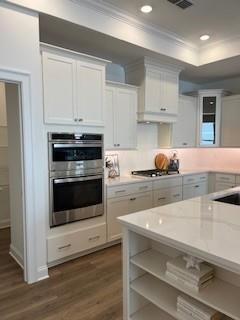 3472 Fishpond Circle Dacula, GA 30019 - Photo 20 of 72 a kitchen with granite countertop white cabinets and appliances