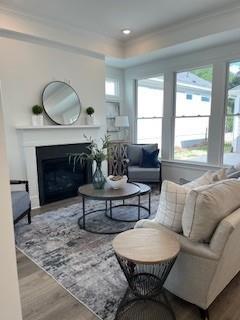 3472 Fishpond Circle Dacula, GA 30019 - Photo 2 of 72 a living room with furniture a window and a fireplace