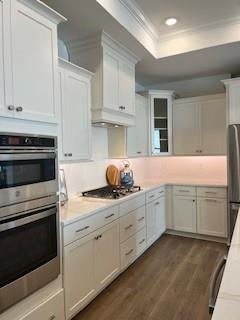 3472 Fishpond Circle Dacula, GA 30019 - Photo 30 of 72 a kitchen with white cabinets and white appliances