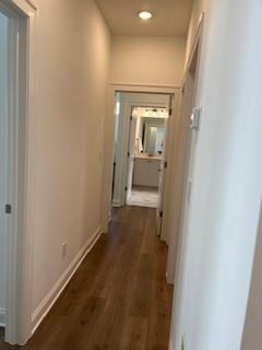 3472 Fishpond Circle Dacula, GA 30019 - Photo 31 of 72 a view of a hallway with wooden floor and a bathroom
