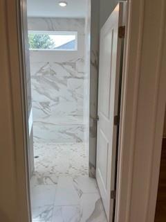 3472 Fishpond Circle Dacula, GA 30019 - Photo 43 of 72 a bathroom with a granite countertop shower and a sink