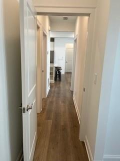 3472 Fishpond Circle Dacula, GA 30019 - Photo 51 of 72 a view of a hallway with a wooden floor
