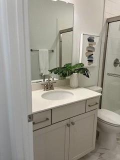 3472 Fishpond Circle Dacula, GA 30019 - Photo 53 of 72 a bathroom with a sink toilet and mirror