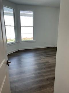 3472 Fishpond Circle Dacula, GA 30019 - Photo 57 of 72 an empty room with wooden floor and windows