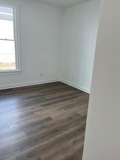 3472 Fishpond Circle Dacula, GA 30019 - Photo 58 of 72 an empty room with wooden floor and windows