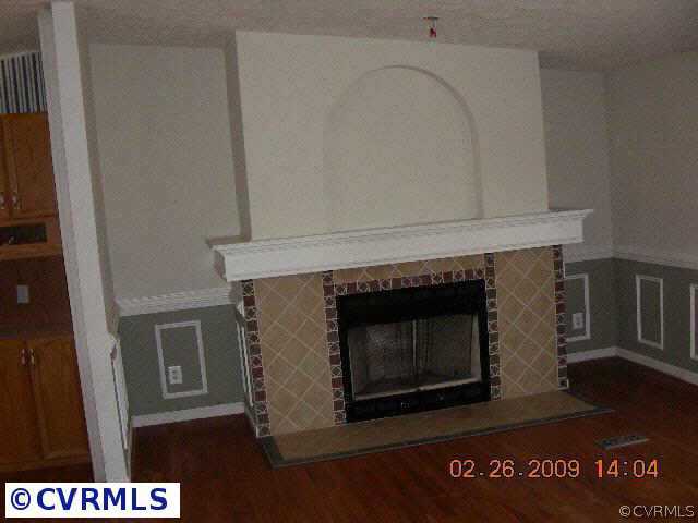 3620 Shirleys Hill Road Partlow, VA 22534 - Photo 2 of 6 a living room with a fireplace