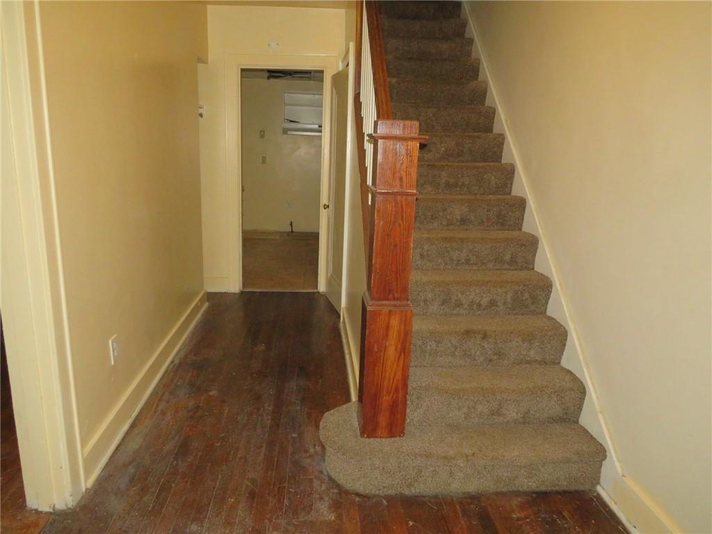 423 Braddock Road Pittsburgh, PA 15221 - Photo 2 of 36 a view of staircase with white walls