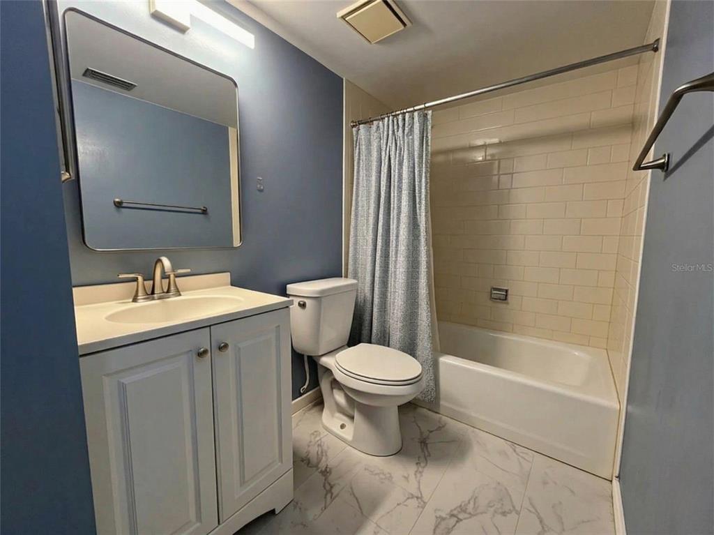 626 Fairways Circle, Unit A Ocala, FL 34472 - Photo 13 of 21 a bathroom with a sink toilet and shower