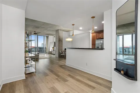 a view of a living room and dining room