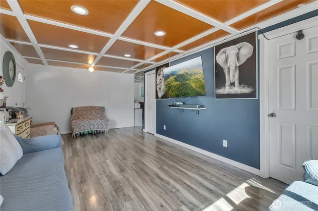 a house with wooden floor and furniture