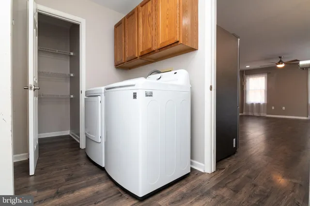 a view of a storage & utility room with wooden floor