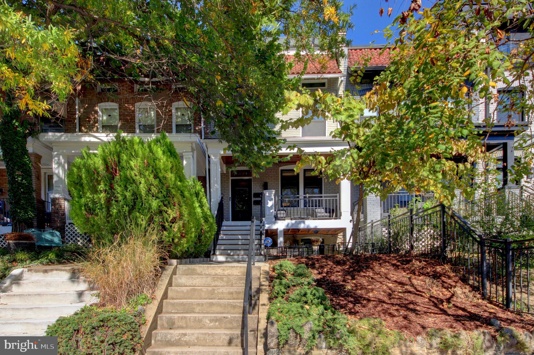 1321 Spring Road Northwest Washington, DC 20010 - Photo 2 of 30 a view of a building with a garden