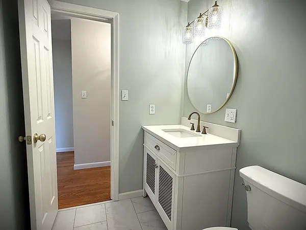 a view of empty room with wooden ceiling