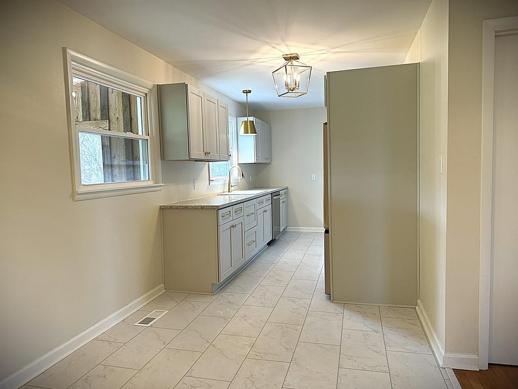 118 Collins Road Allons, TN 38541 - Photo 16 of 64 a large bathroom with a sink a mirror and a shower