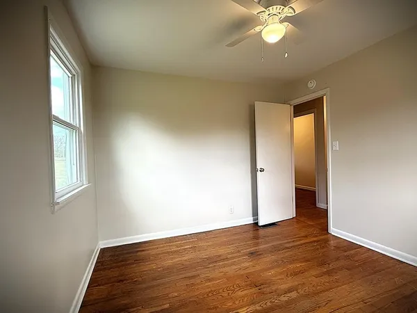 a view of a room with windows