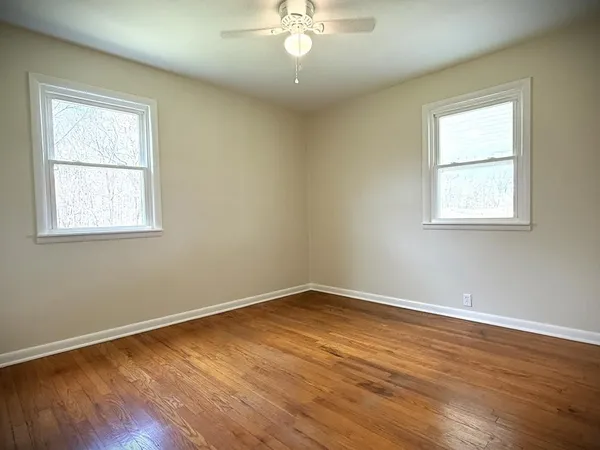 a view of a bedroom with washer and dryer