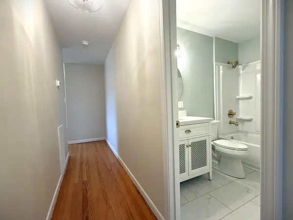 a kitchen with a sink and a stove top oven