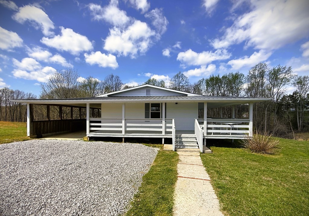 118 Collins Road Allons, TN 38541 - Photo 4 of 64 a front view of house with yard and entertaining space