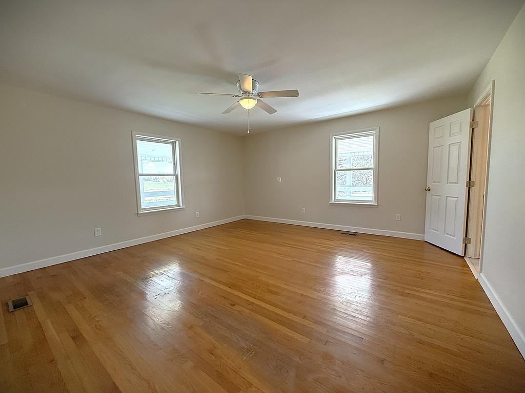 118 Collins Road Allons, TN 38541 - Photo 48 of 64 a view of empty room with wooden floor and fan