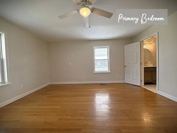 a front view of house with yard and entertaining space