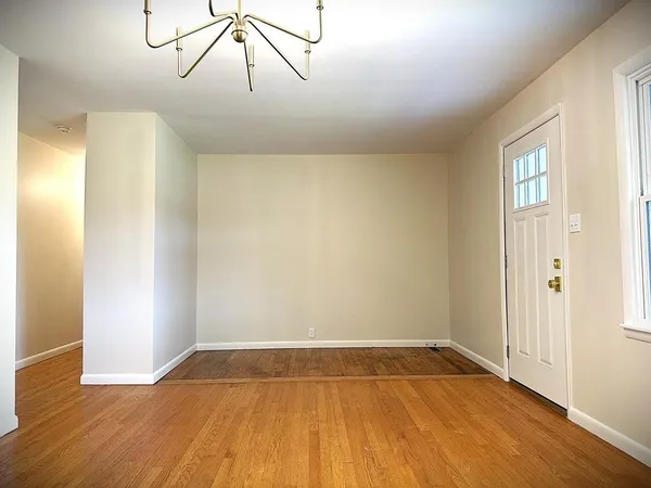 a bathroom with a sink a mirror and bathtub