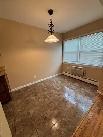a view of a room with an empty space
