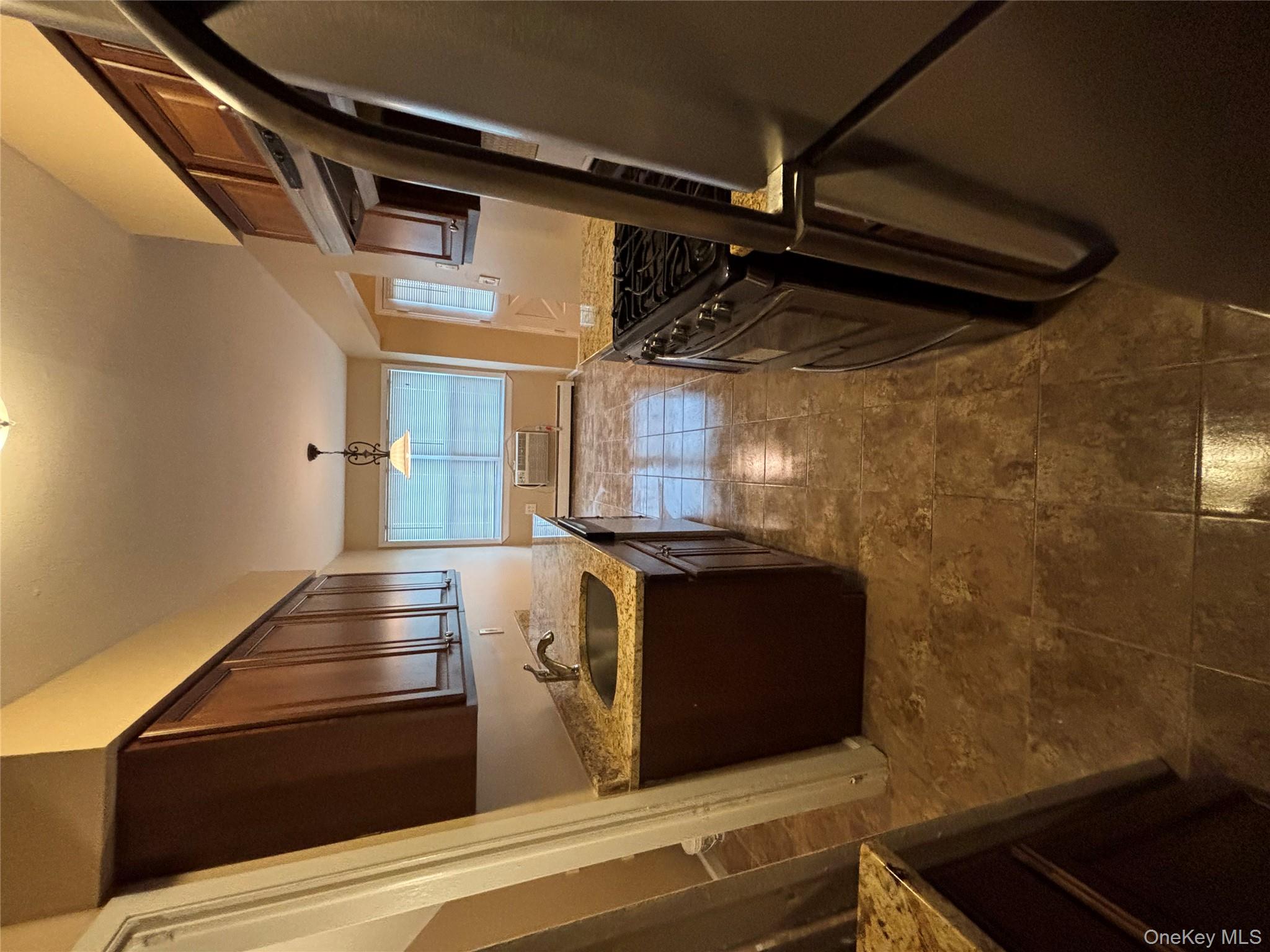 4 Colonial Road, Unit 92 Beacon, NY 12508 - Photo 4 of 9 a view of kitchen with window and refrigerator