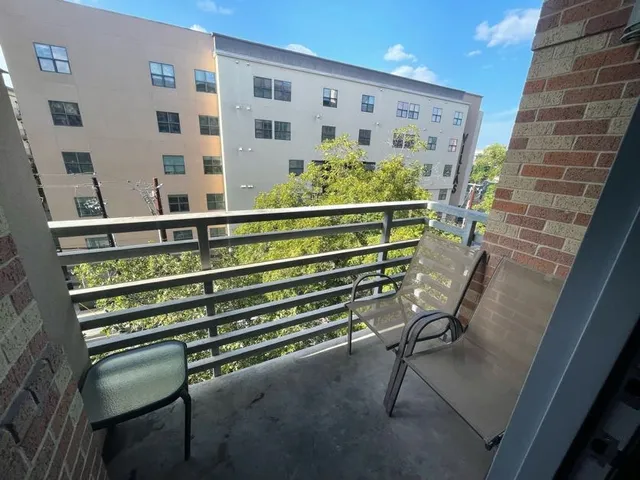a view of entryway with wooden door