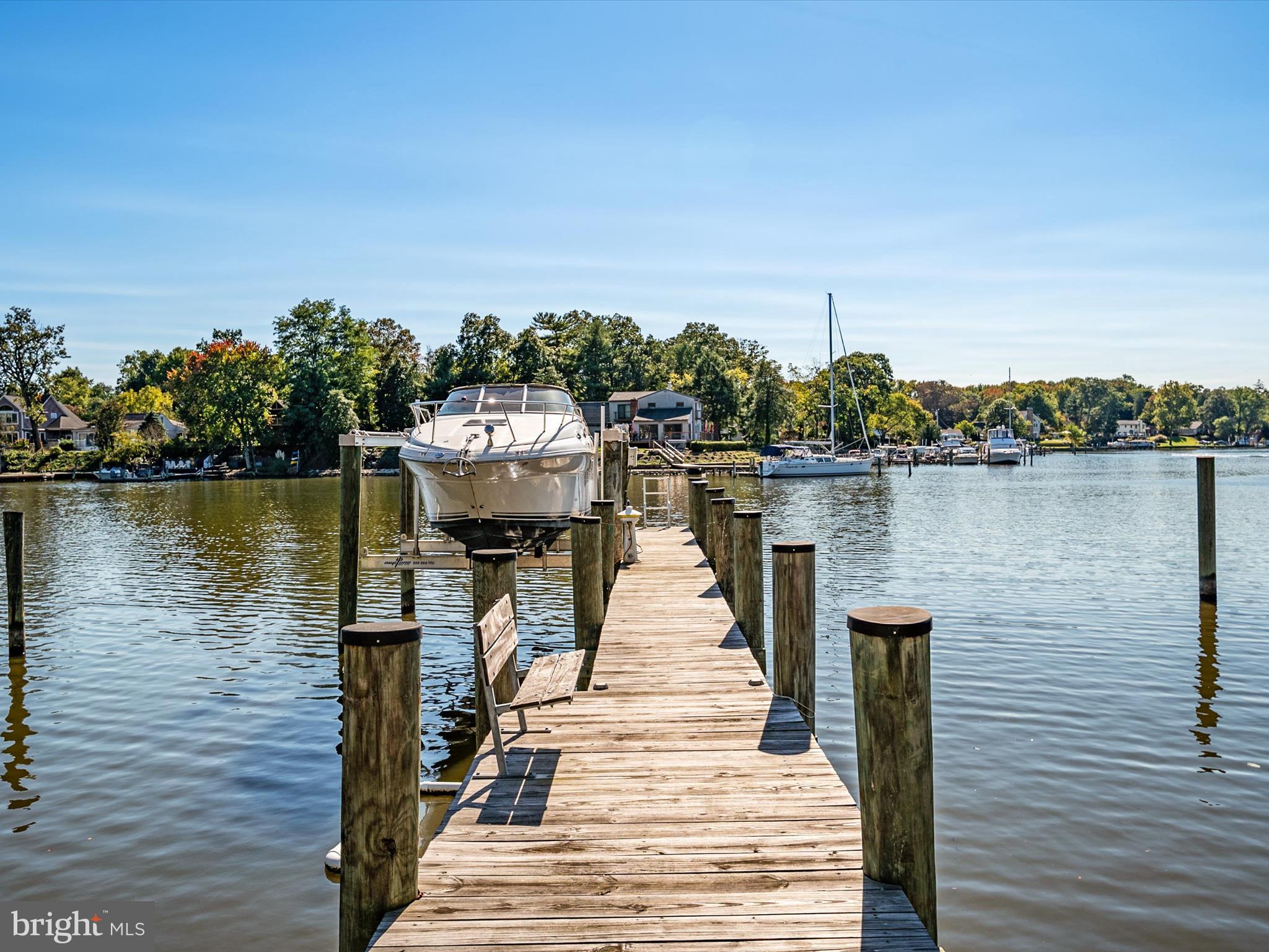 8206 Riverside Drive Pasadena, MD 21122 - Photo 28 of 62 100 ft. deep water pier with 12k boatlift