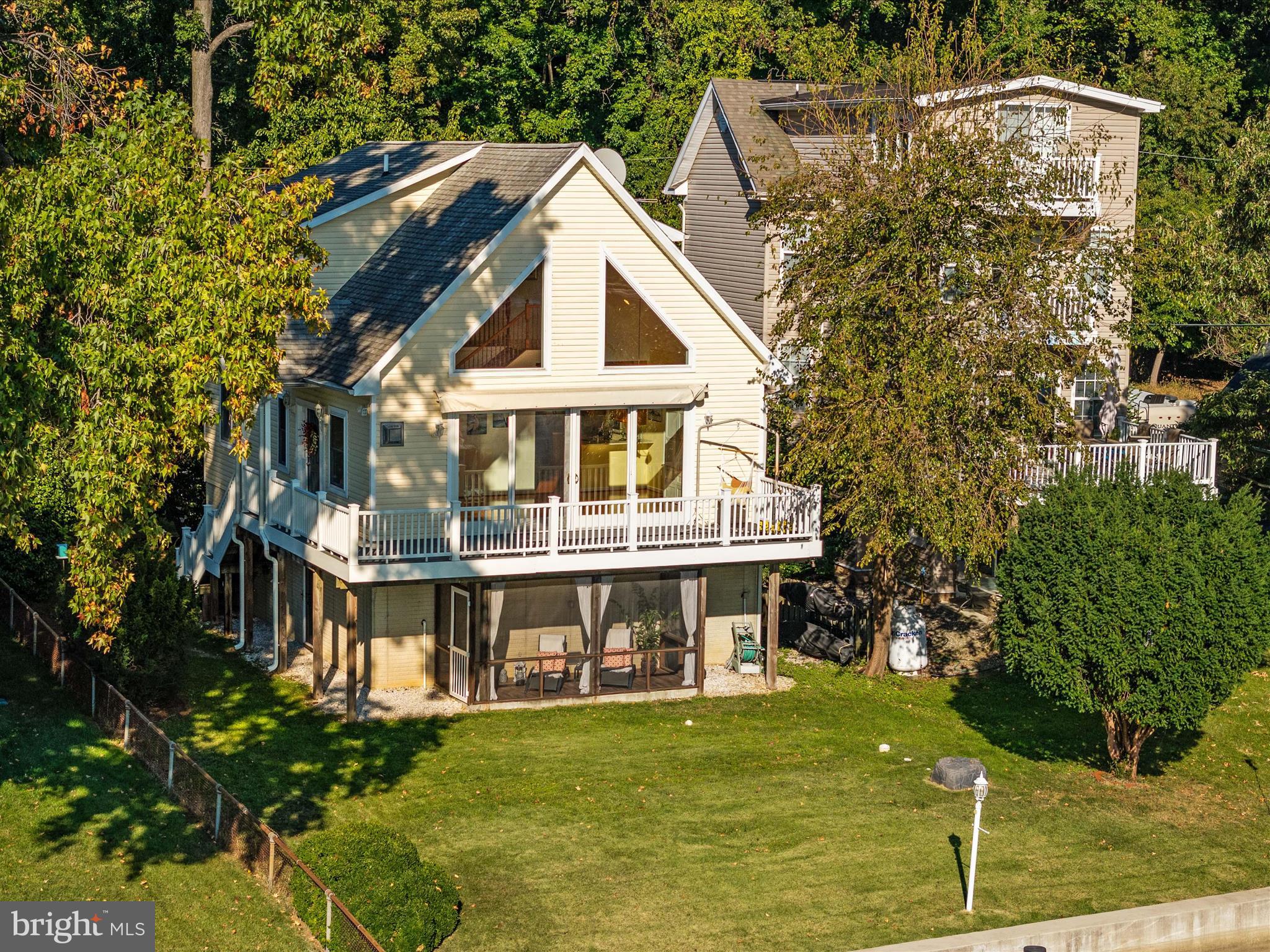 8206 Riverside Drive Pasadena, MD 21122 - Photo 6 of 62 Expansive wrap around deck